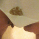 Ms. Poop Alot shits in her panties, and some of the poop spills out of her panties and onto the bathroom floor! She later pulls down the panties and shows off the huge load and mess left on her ass. 